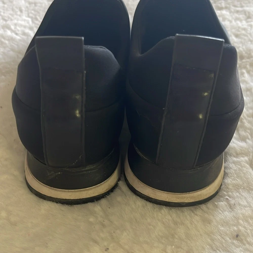 DKNY Black Slip-On Sneakers with Black Shine Logo